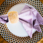 A napkin folded in the shape of an angel.
